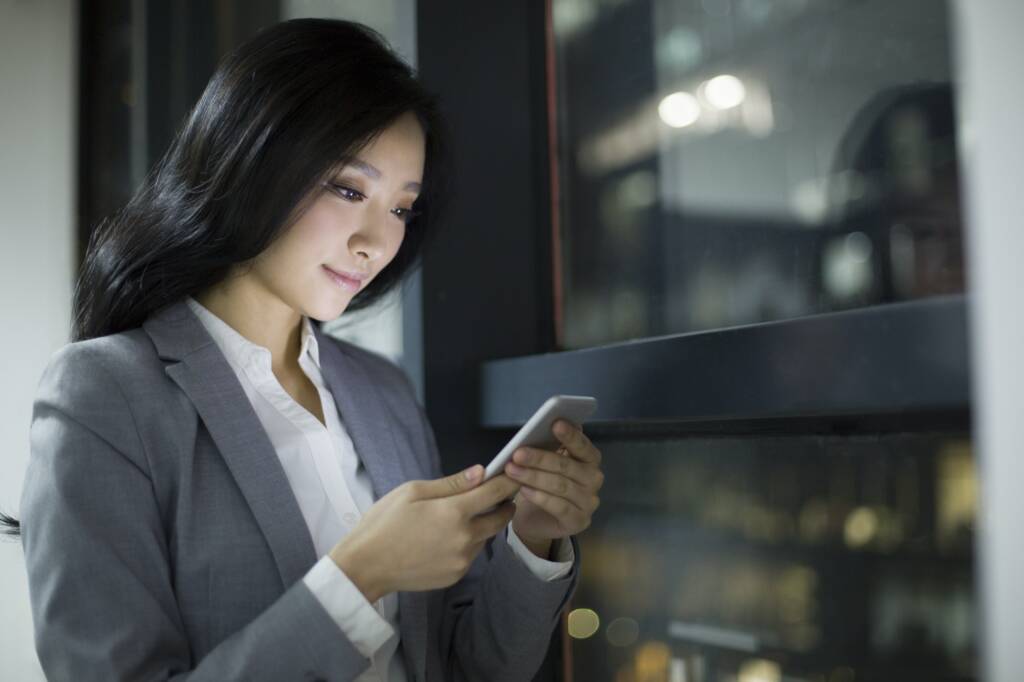 Businesswoman using smart phone